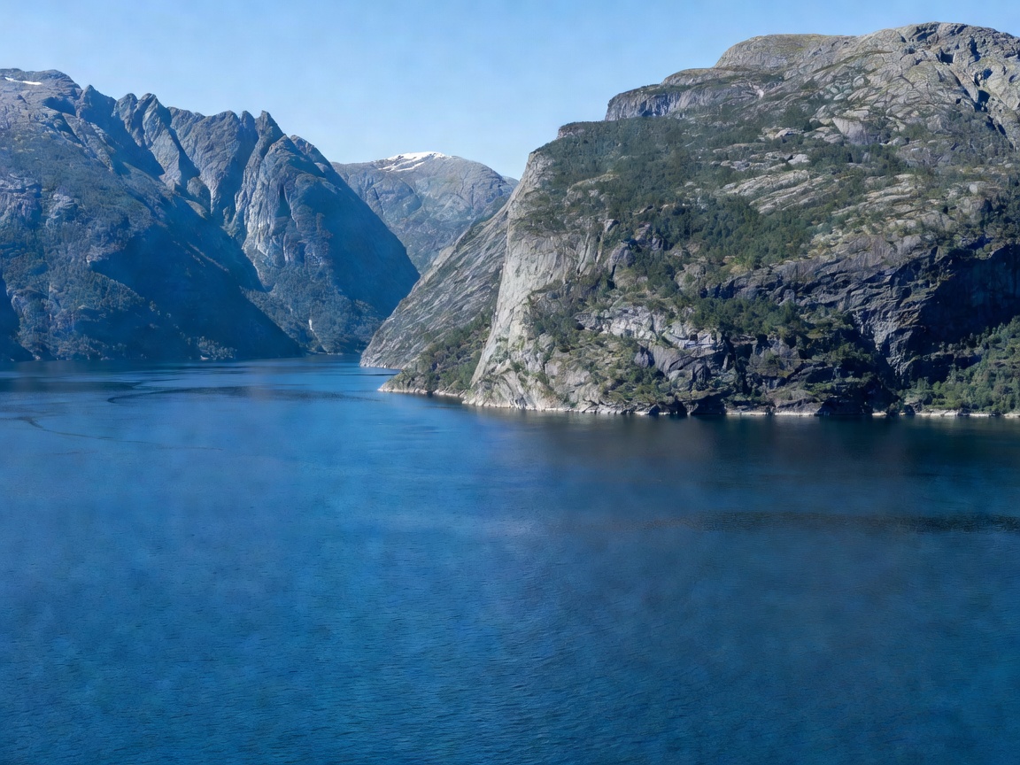 Vast expanse of blue water and rugged shoreline in Sognefjord